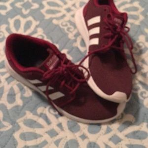 Cranberry red adidas tennis shoes